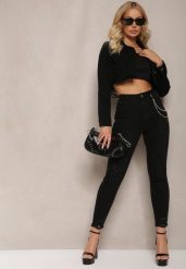 Czarne Jeansy z Łańcuszkiem w Komplecie Ozdobione Dziurami Tiidana. Czarne jeansy Renee, bez wzorów, z bawełny, eleganckie, z podwyższonym stanem. W wyprzedaży za 59.99 zł.