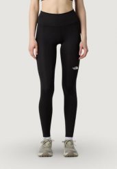Legginsy Kobieta THE NORTH FACE W FLEX 28IN TIGHT. Czarne legginsy sportowe The North Face, l, bez wzorów, z elastanu, z podwyższonym stanem, na fitness i siłownię. Za 281.50 zł.