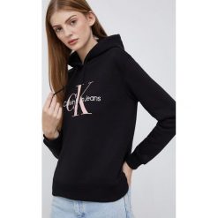 Calvin Klein Jeans bluza damska kolor czarny z kapturem gładka. Czarne bluzy Calvin Klein Jeans, l, z aplikacjami, z jeansu, bez ramiączek, z kapturem. Za 539.99 zł.