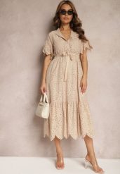 Beżowa Bawełniana Sukienka o Rozkloszowanym Kroju z Haftem z Guzikami i Gumką w Pasie Lovarae. Brązowe sukienki Renee, l, bez wzorów, z bawełny, eleganckie, bez kołnierzyka, bez ramiączek, midi, rozkloszowane. W wyprzedaży za 159.99 zł.