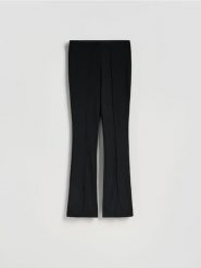 Legginsy z rozcięciami - czarny. Czarne legginsy Reserved, bez wzorów, z dzianiny. Za 89.99 zł.