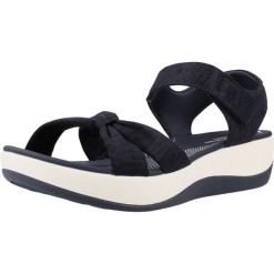 Sandały CLARKS ARLA SHORE Niebieski. Niebieskie sandały Clarks, bez wzorów, z syntetyku, bez obcasa, bez zapięcia. Za 132.99 zł.