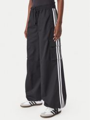 Adidas Spodnie dresowe Firebird Adilenium Twill 3S Cargo Trousers KQ6428 Czarny Relaxed Fit. Czarne spodnie dresowe adidas, bez wzorów, z dresówki. Za 369.99 zł.