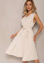 Beżowa Plisowana Sukienka Midi z Plisami na Dole i Paskiem w Talii Wrensilva. Brązowe sukienki Renee, l, bez wzorów, z materiału, eleganckie, bez kołnierzyka, bez ramiączek, midi, rozkloszowane. W wyprzedaży za 47.99 zł.