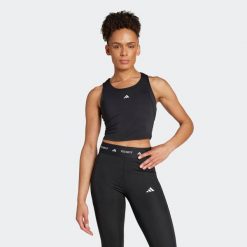 Koszulka fitness damska ADIDAS bez rękawów. T-shirty sportowe adidas, l, bez wzorów, ze skóry, bez ramiączek, na fitness i siłownię. Za 139.99 zł.