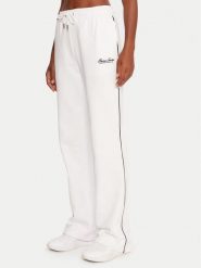 Guess Jeans Spodnie dresowe W5YB32 K68I4 Biały Regular Fit. Białe spodnie dresowe Guess Jeans, z aplikacjami, z bawełny. Za 299.99 zł.