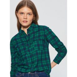 Koszula w kratę - Zielony. Koszule marki QUECHUA. W wyprzedaży za 29.99 zł.