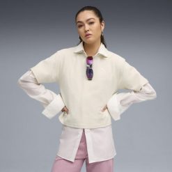 Damska koszulka polo PUMA Class o luźnym kroju PUMA. Białe t-shirty sportowe Puma, bez wzorów, bez ramiączek. Za 129.00 zł.