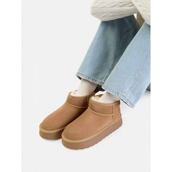 Botki Badura. Brązowe śniegowce Badura, bez wzorów, bez zapięcia. Za 229.99 zł.