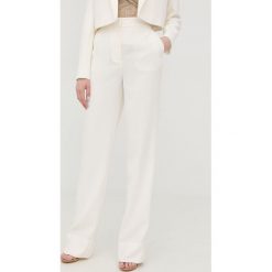 Pinko spodnie damskie kolor beżowy proste high waist. Brązowe spodnie materiałowe Pinko, bez wzorów, z materiału, z podwyższonym stanem. Za 869.99 zł.