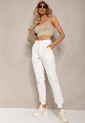 Białe Dresowe Spodnie High Waist z Błyszczącym Sznurkiem w Pasie Darciasa. Białe jeansy Renee, xl, bez wzorów, z dresówki, z podwyższonym stanem. W wyprzedaży za 26.99 zł.
