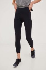 Under Armour legginsy treningowe Rush damskie kolor czarny gładkie. Czarne legginsy Under Armour, bez wzorów, ze skóry. W wyprzedaży za 229.99 zł.