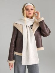 Szalik - kremowy. Białe szaliki i kominy Sinsay, bez wzorów, z włókna. Za 39.99 zł.