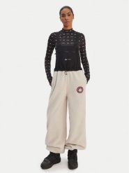 Adidas Ogrodniczki Moon Boot JM1106 Beżowy Loose Fit. Brązowe spodnie materiałowe adidas, bez wzorów, z materiału. Za 439.99 zł.