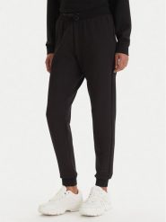 Armani Exchange Spodnie dresowe XW000828 AF13397 UC001 Czarny Regular Fit. Czarne spodnie dresowe Armani Exchange, bez wzorów, z dresówki. Za 519.99 zł.