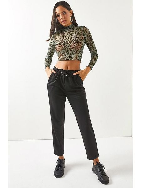 Olalook Spodnie w kolorze czarnym rozmiar: 42. Czarne spodnie materiałowe Olalook, bez wzorów, z materiału. Za 44.95 zł.