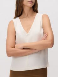 Bluzka o kroju kamizelki - złamana biel. Bluzki Reserved, l, bez wzorów, z dzianiny, bez kołnierzyka, bez ramiączek. W wyprzedaży za 59.99 zł.