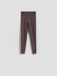 Gładkie legginsy - brązowy. Brązowe legginsy Reserved, bez wzorów, z dzianiny. Za 89.99 zł.