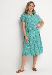 Ciemnozielona Bawełniana Sukienka Koszulowa w Kwiaty z Rozkloszowanym Dołem Jerilsa. Zielone sukienki Born2be, na co dzień, l, bez wzorów, z bawełny, eleganckie, bez kołnierzyka, bez ramiączek, midi, koszulowe. W wyprzedaży za 38.24 zł.