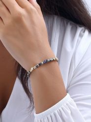 Luja Bijoux Pozłacana bransoletka z syntetycznymi perłami rozmiar: onesize. Czarne bransoletki Luja Bijoux, z perłą, pozłacane. Za 57.06 zł.