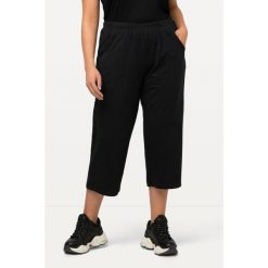 Damskie bis 58+| Spodnie dresowe 7/8 | Spodnie dresowe z elastyczną. Czarne spodnie sportowe Ulla Popken, bez wzorów, z bawełny, długie. W wyprzedaży za 100.99 zł.