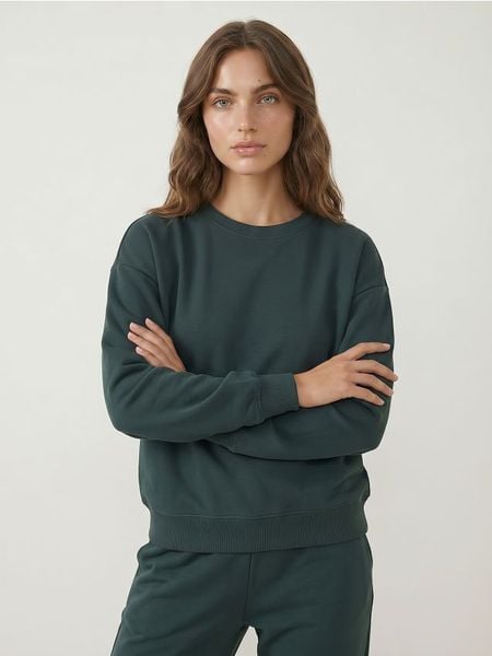 Dresowa bluza crewneck basic - zielony. Zielone bluzy Sinsay, l, bez wzorów, z dresówki, bez ramiączek, bez kaptura. Za 35.99 zł.