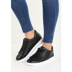 Czarne Buty Sportowe Slipcover. Buty treningowe marki KALENJI. Za 49.99 zł.