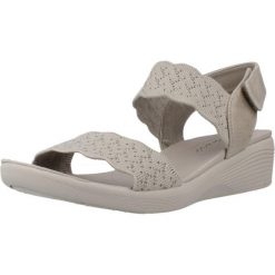 Sandały SKECHERS ARYA Beżowy. Brązowe sandały Skechers, bez wzorów, z materiału, bez obcasa, bez zapięcia. Za 207.99 zł.