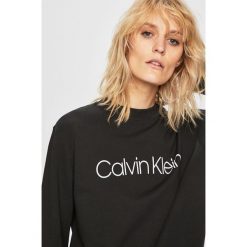 Calvin Klein - Bluza. Białe bluzy Calvin Klein, l, bez wzorów, z bawełny, bez kaptura. Za 379.90 zł.
