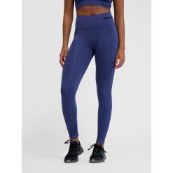 Damskie legginsy bezszwowe z wysoką talią Hummel TIF. Niebieskie legginsy Hummel, bez wzorów, sportowe. Za 143.00 zł.
