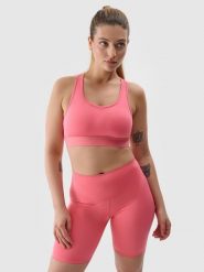 4F Legginsy kolarki treningowe z materiału z recyklingu damskie - koralowe L. Czerwone legginsy 4f, bez wzorów, z dzianiny, sportowe. W wyprzedaży za 59.99 zł.
