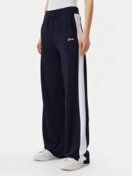 Guess Spodnie dresowe V5GB00 Z3D60 Granatowy Regular Fit. Niebieskie spodnie dresowe Guess, z aplikacjami, z dresówki. Za 319.99 zł.