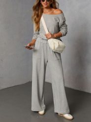 LA Angels 2-częściowy zestaw w kolorze szarym rozmiar: L. Szare spodnie dresowe LA Angels, bez wzorów, z dresówki. Za 231.13 zł.