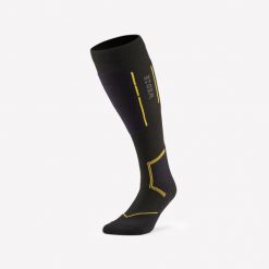 Skarpety narciarskie dla dorosłych Wedze 500 Merino Wool z wełną merynosa. Brązowe skarpetki WED'ZE, bez wzorów, z dzianiny, narciarskie. Za 49.99 zł.