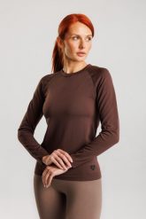 Koszulka treningowa bezszwowa damska z długim rękawem Dakota. Czerwone t-shirty sportowe Make Us Strong, s, bez wzorów, z materiału, bez ramiączek, na fitness i siłownię. Za 124.99 zł.