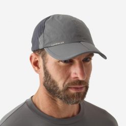 Czapka wędkarska z daszkiem Caperlan FC 500 F składana. Szare czapki z daszkiem CAPERLAN, bez wzorów, z poliamidu. Za 54.99 zł.