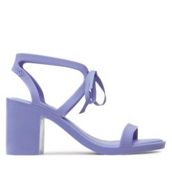 Sandały Melissa. Niebieskie sandały Melissa, bez wzorów, bez obcasa, na słupku, bez zapięcia. Za 449.99 zł.