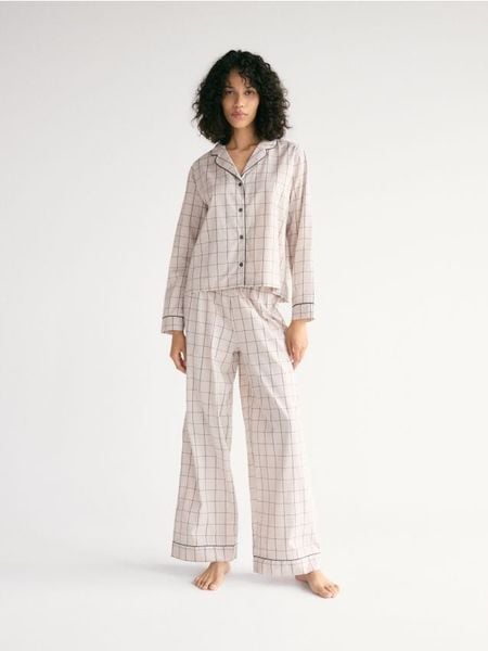 Dwuczęściowa piżama w kratę - beżowy. Brązowe piżamy Reserved, l, bez wzorów, z bawełny, bez kołnierzyka, bez ramiączek. Za 149.99 zł.