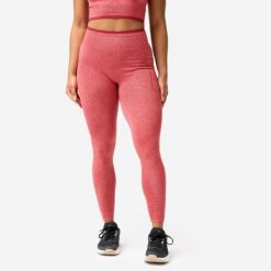 Legginsy do treningu siłowego damskie Domyos seamless. Czerwone legginsy DOMYOS, bez wzorów, z elastanu, sportowe. Za 119.99 zł.