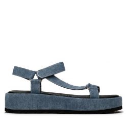 Sandały JENNY. Niebieskie sandały Jenny, bez wzorów, bez obcasa, na płaskiej podeszwie, bez zapięcia. Za 139.99 zł.