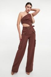 Kombinezon damski VERSACE JEANS COUTURE. Kombinezony Versace Jeans Couture, bez wzorów, z jeansu, bez kołnierzyka, bez ramiączek. W wyprzedaży za 1,793.40 zł.