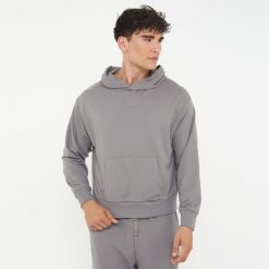 Unisex bluza z kapturem F BOXY ciemnoszara. Szare bluzy LEGEA, s, bez wzorów, z bawełny, bez ramiączek, z kapturem. Za 96.00 zł.