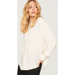 Koszula oversize - Kremowy. Koszule marki QUECHUA. W wyprzedaży za 79.99 zł.