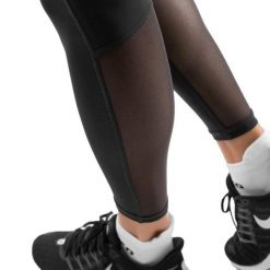 Damskie legginsy do biegania Fitness Siroko Fighter. Czarne legginsy SIROKO, bez wzorów, z materiału, sportowe. Za 127.00 zł.