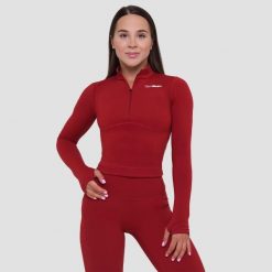 Koszulka damska fitness z zamkiem czerwona Ignite. Czerwone t-shirty sportowe GYMBEAM, l, bez wzorów, z dresówki, bez ramiączek, na fitness i siłownię. Za 114.90 zł.