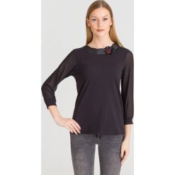 BLUZKA LIU JO. Czarne bluzki Liu Jo, l, z aplikacjami, z tkaniny, bez kołnierzyka, bez ramiączek. Za 229.50 zł.