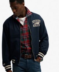 Superdry Kurtka Bomber Twill Varsity z mieszanki bawełny. Niebieskie kurtki Superdry, m, bez wzorów, z bawełny, bez kaptura. Za 304.00 zł.
