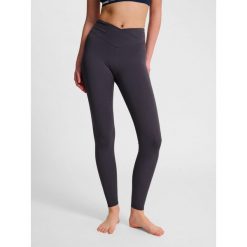 Damskie legginsy z wysokim stanem Hummel Wrap. Brązowe legginsy Hummel, bez wzorów, sportowe. Za 236.50 zł.