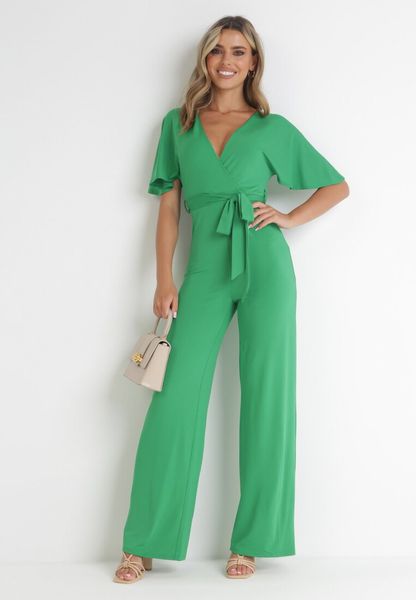 Zielony Długi Kombinezon z Kopertowym Dekoltem i Ozdobnym Wiązaniem Abrarani. Zielone kombinezony Born2be, do pracy, l, bez wzorów, biznesowe, bez kołnierzyka, bez ramiączek, maxi, kopertowe. Za 149.99 zł.