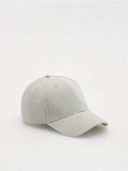 Czapka z daszkiem - jasnoturkusowy. Niebieskie czapki z daszkiem Reserved, bez wzorów. W wyprzedaży za 39.99 zł.